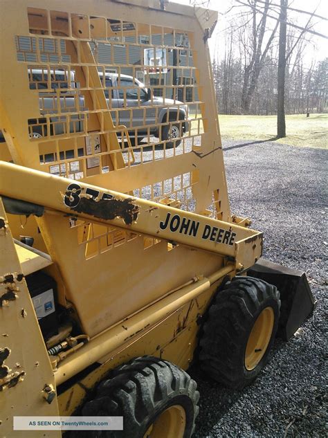 john deere 375 skid steer hydraulic pump|john deere 375 specifications.